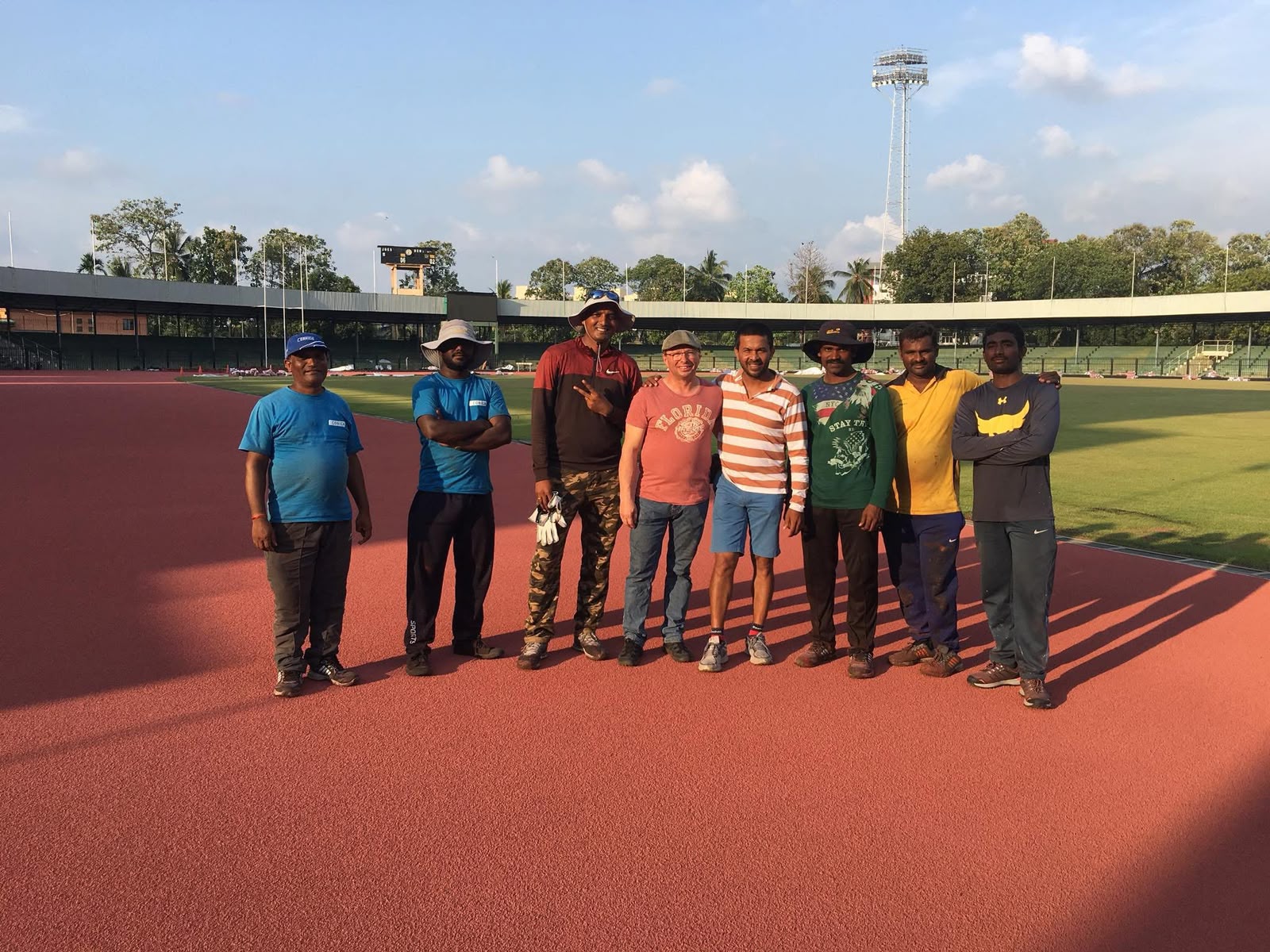 The Veritas Technologies team on a completed athletics track